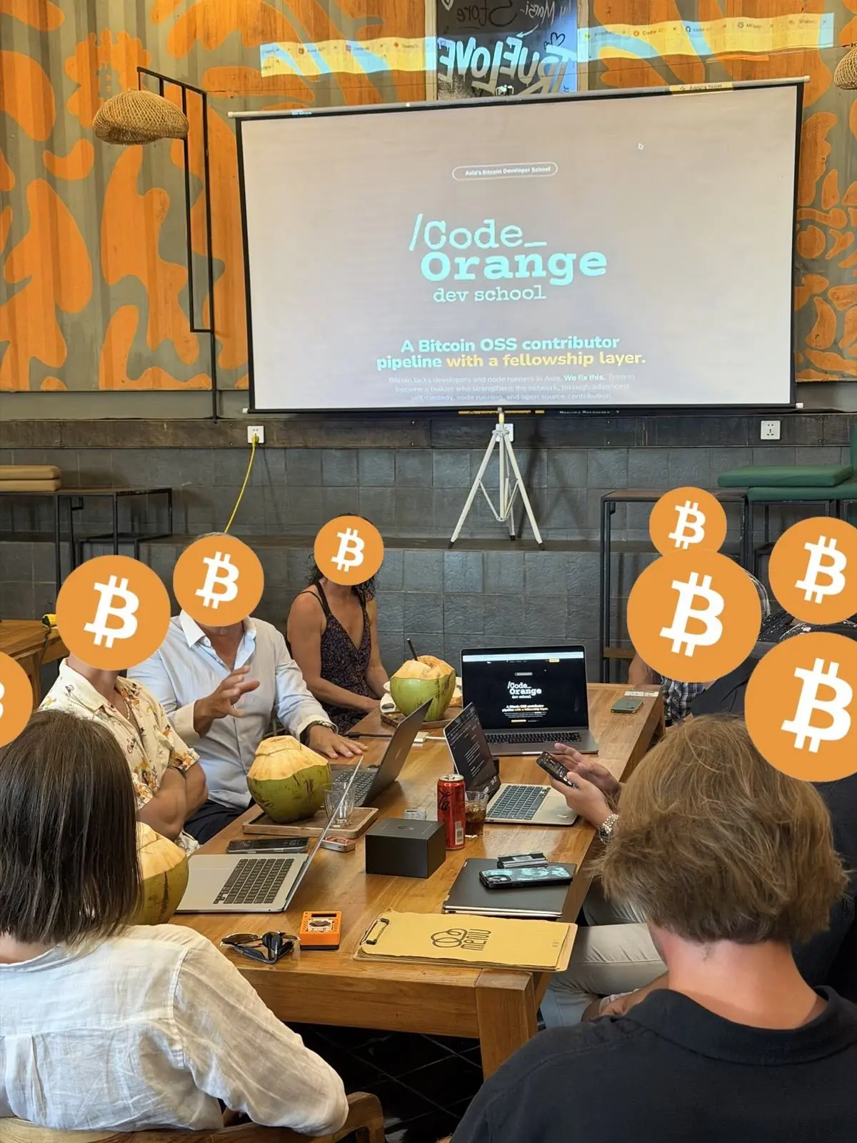 Code Orange fellowship presentation with students around a table